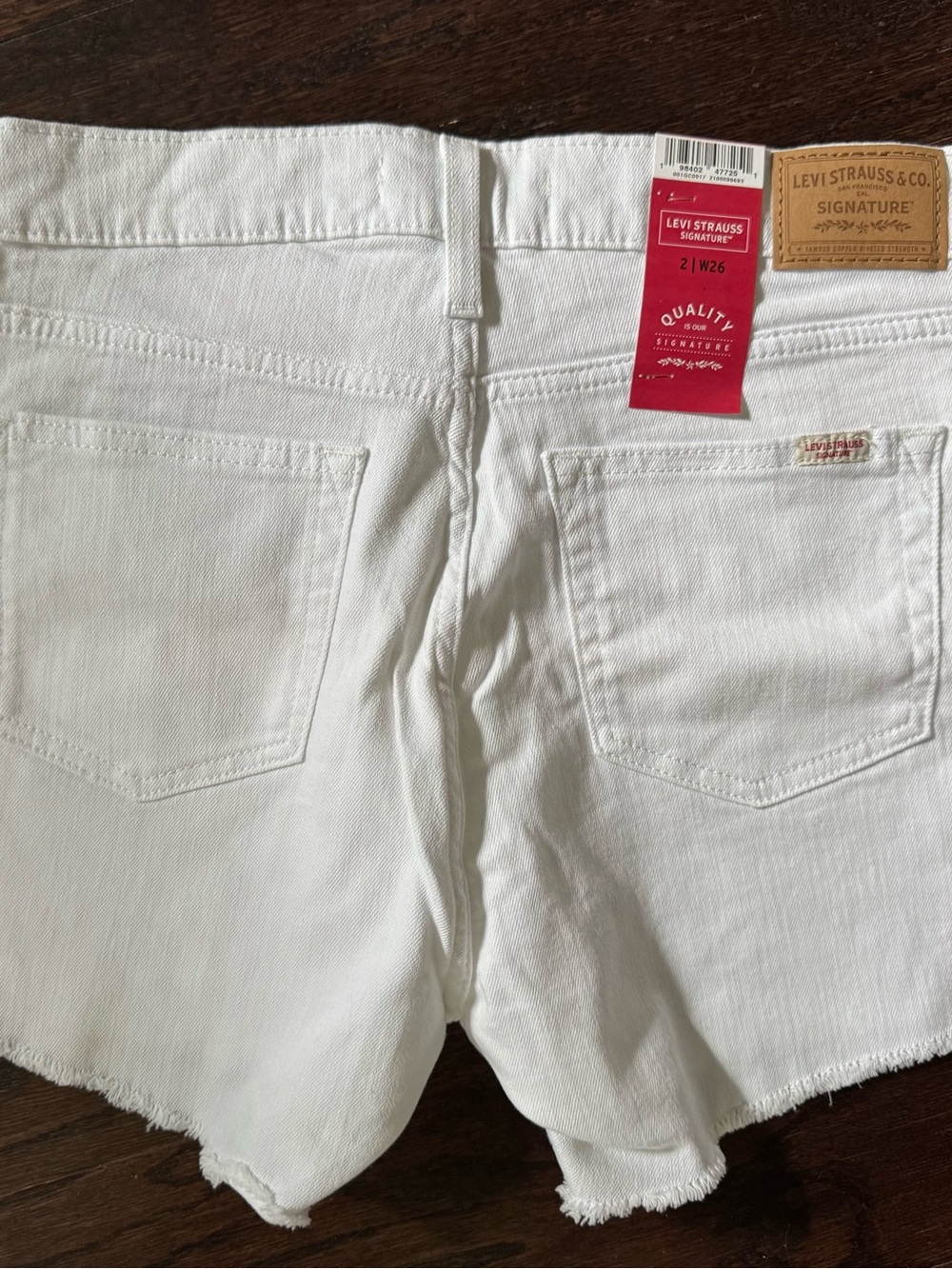 Levi's White High-Rise Raw-Hem Denim Shorts - Picture 3 of 5
